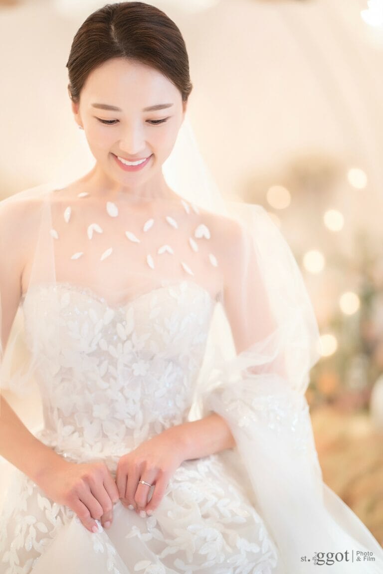 Mira bride wearing Audrey gown and matching cape