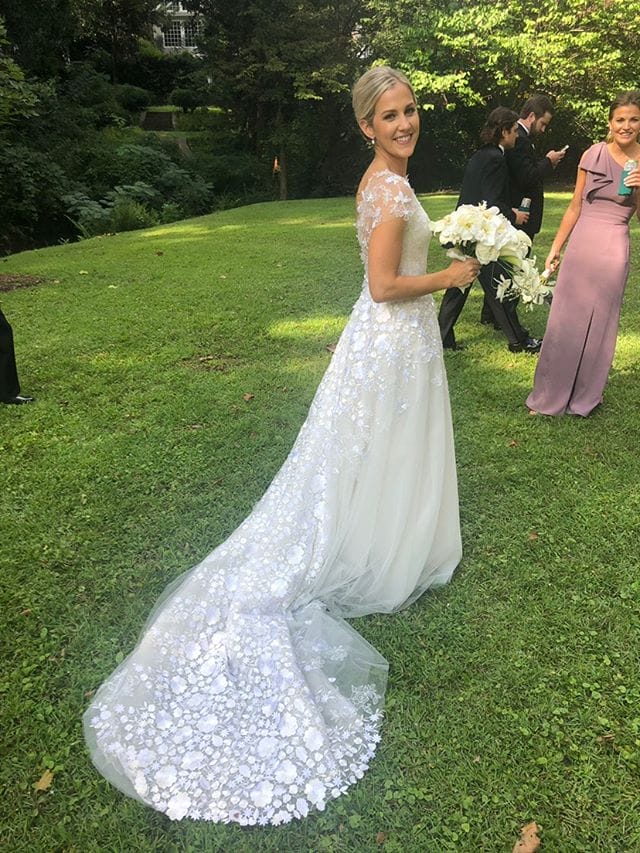 Meredith wearing Andi gown with marching topper