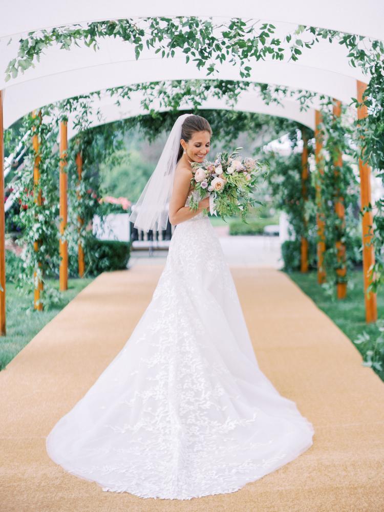 Chelsea Wearing Charla gown
