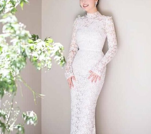 Mira bride wearing Alena gown