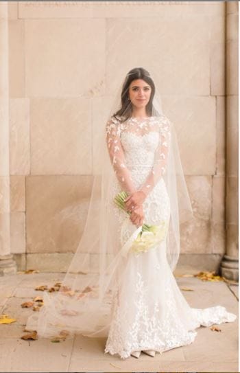Jessica wearing Chaz gown and matching topper