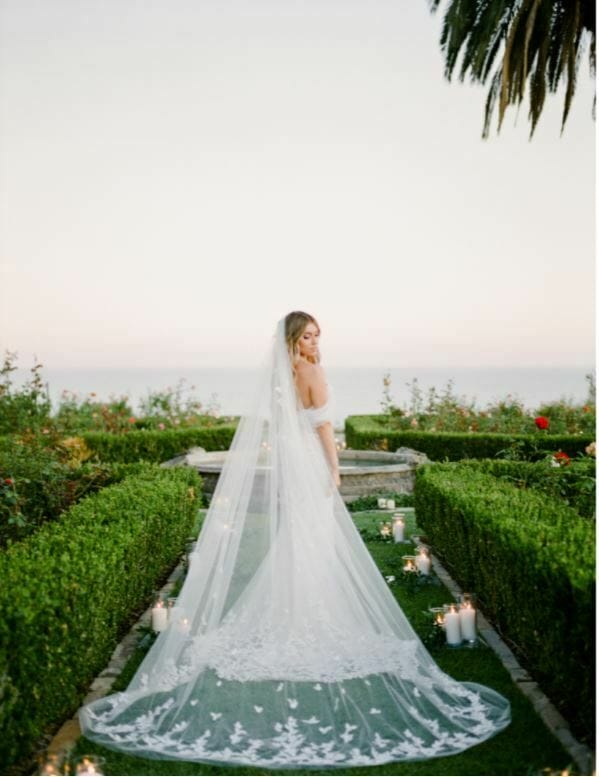 Sade wearing Chaz gown and matching Chaz veil