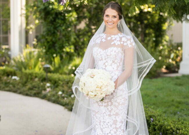 Stephanie wearing Riley gown and matching topper