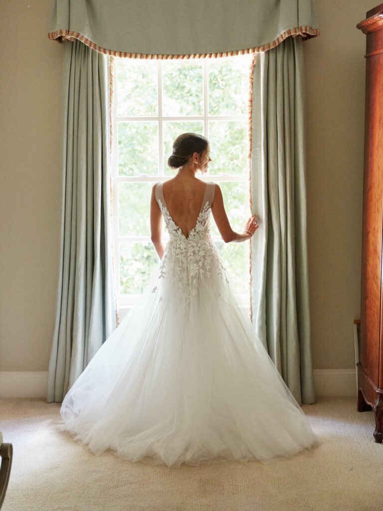 Christina wearing Elli gown