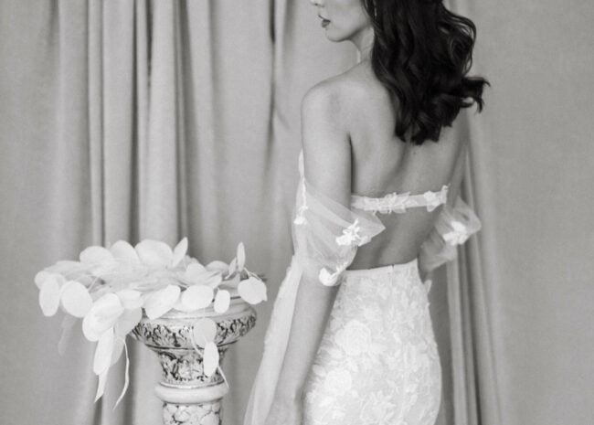 Rosanna wearing Mati gown & draped tulle sleeves