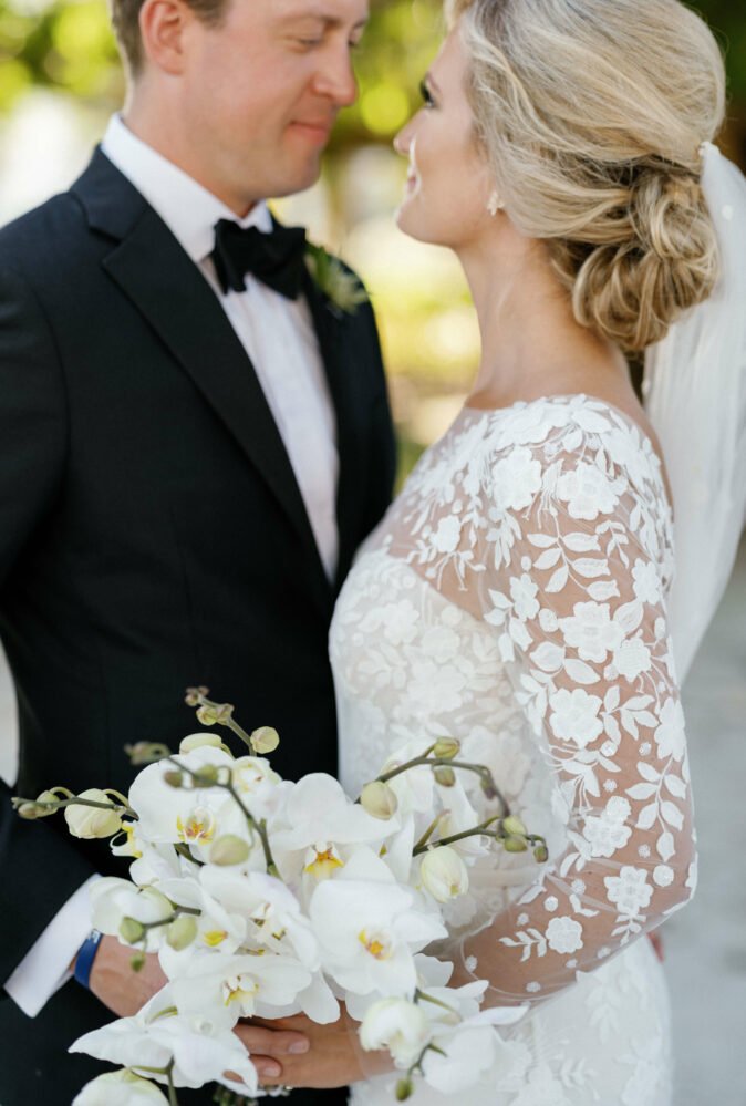 Kristen wearing custom strapless Verona gown, topper & veil