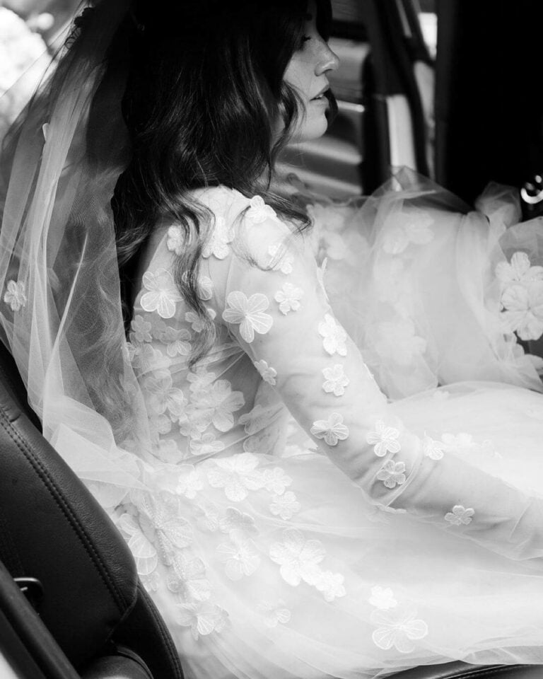 Christina wearing Ari gown, topper & veil