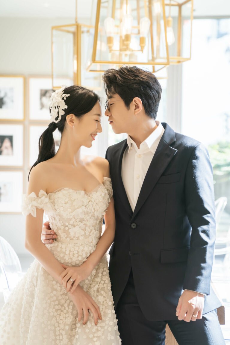 Mira bride wearing Gigi gown & cuffs