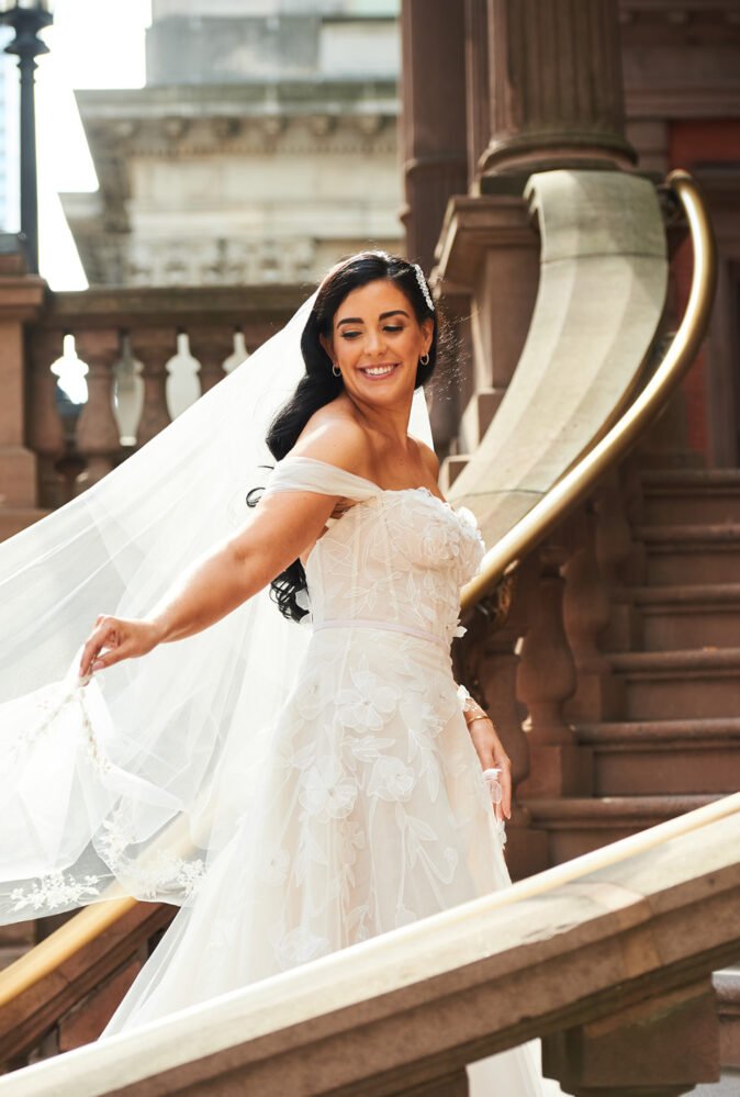 Jenna wearing Sallee gown & detachable draped sleeves