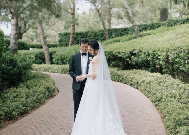 Laura Chen wearing Charla & matching veil