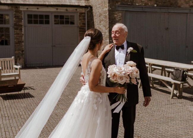 Danielle Betts wearing Ari gown & matching veil