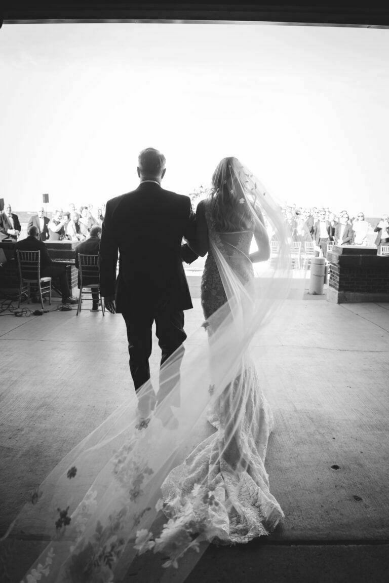 Kelly Ashmore wearing Jona gown and matching veil