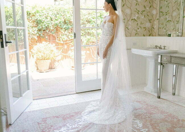 Lauren McGill wearing Chaz gown & matching veil