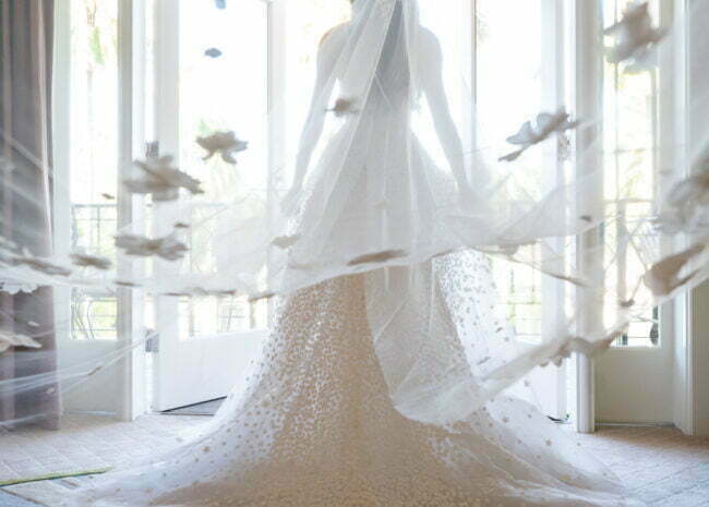 Ashley Asherian wearing Gigi gown and matching veil