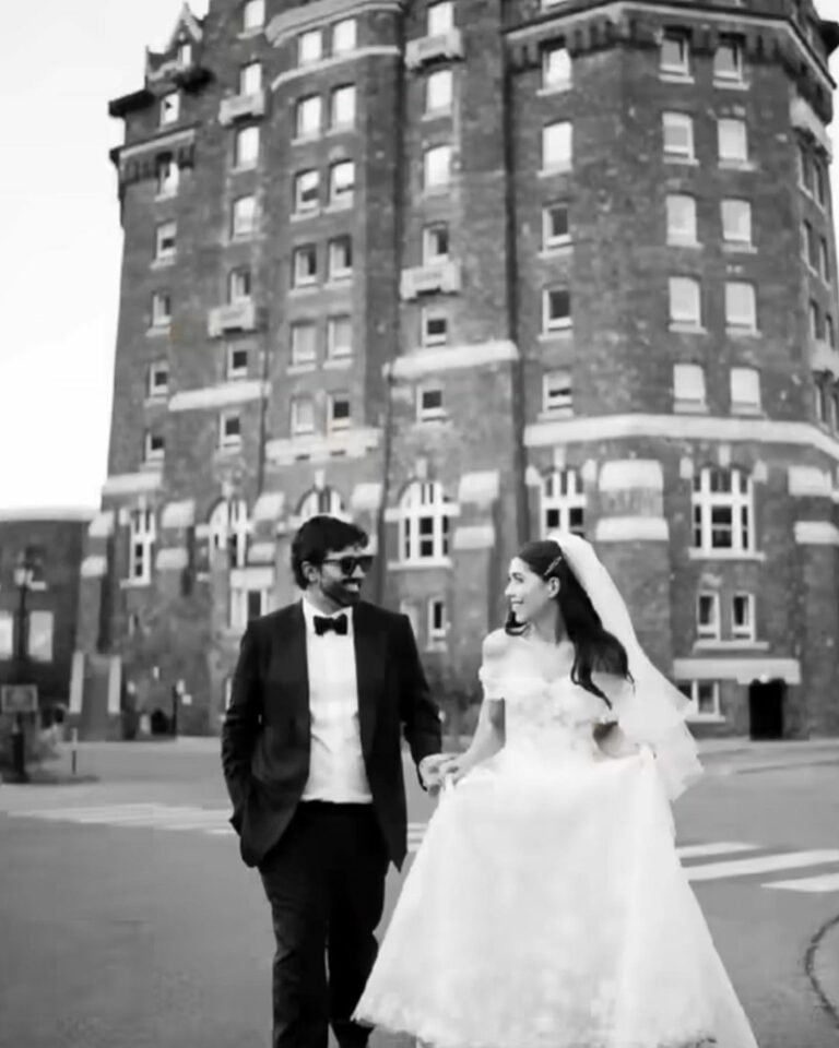Nicole White wearing Kaylyn gown with matching cuffs