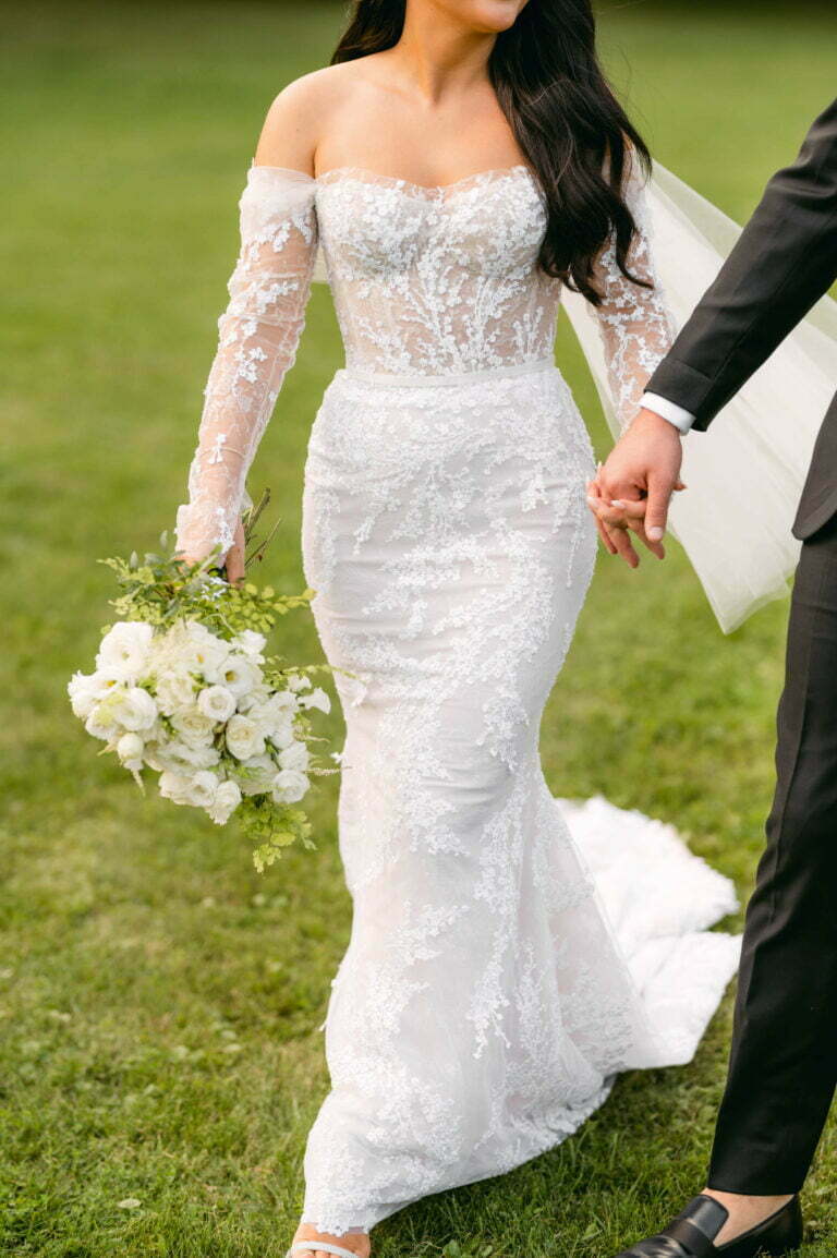 Brooke Mclay wearing Jess gown with matchig cuffs and sleeves