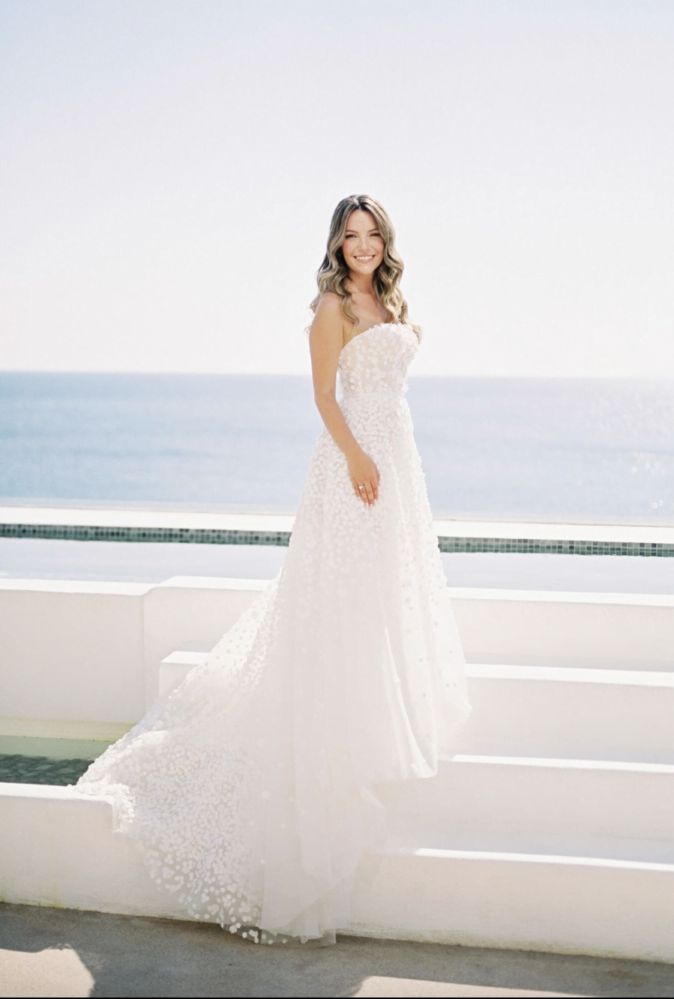Danae Dermatis wearing Gigi gown