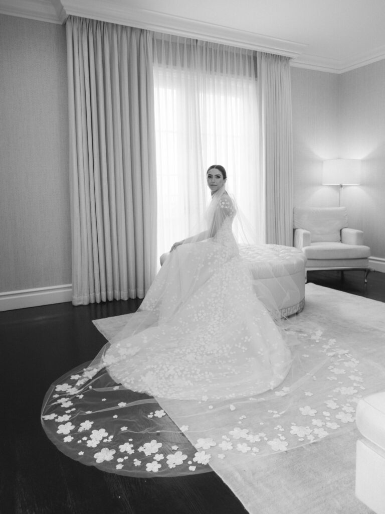 Amanda Michaud in Karla gown with matching veil and short-sleeve topper